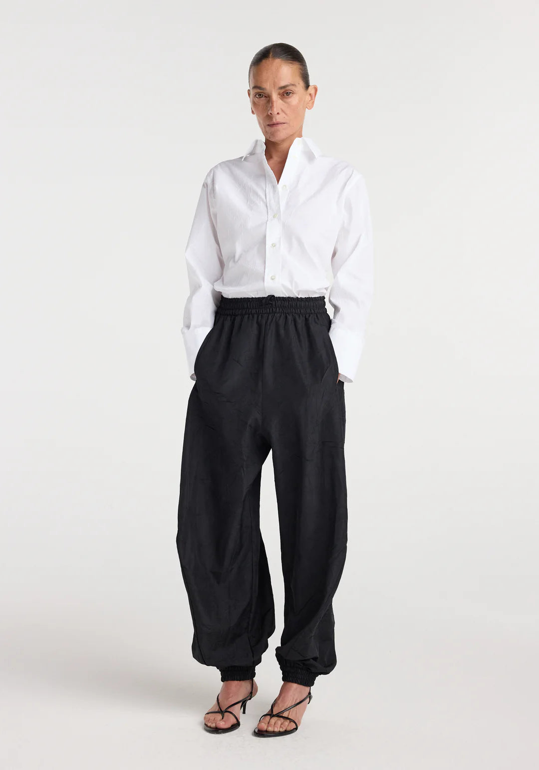 Balloon track pants: Black
