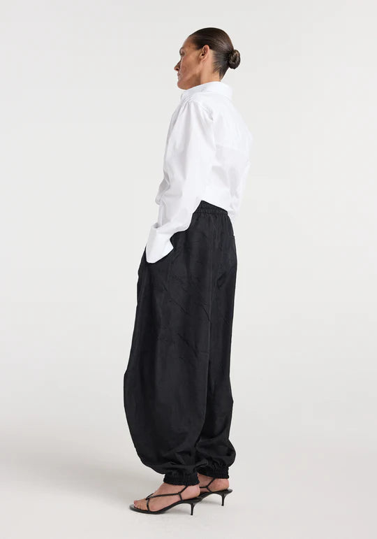 Balloon track pants: Black