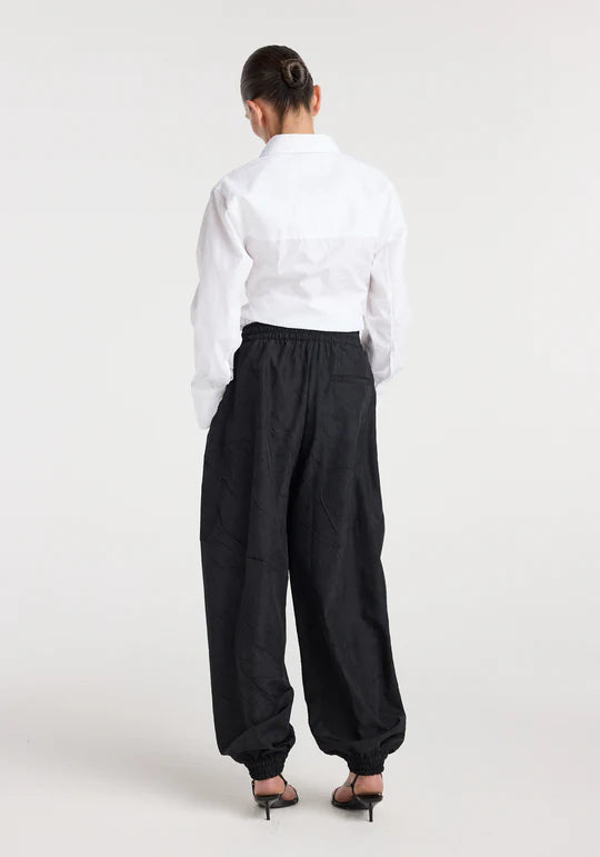 Balloon track pants: Black