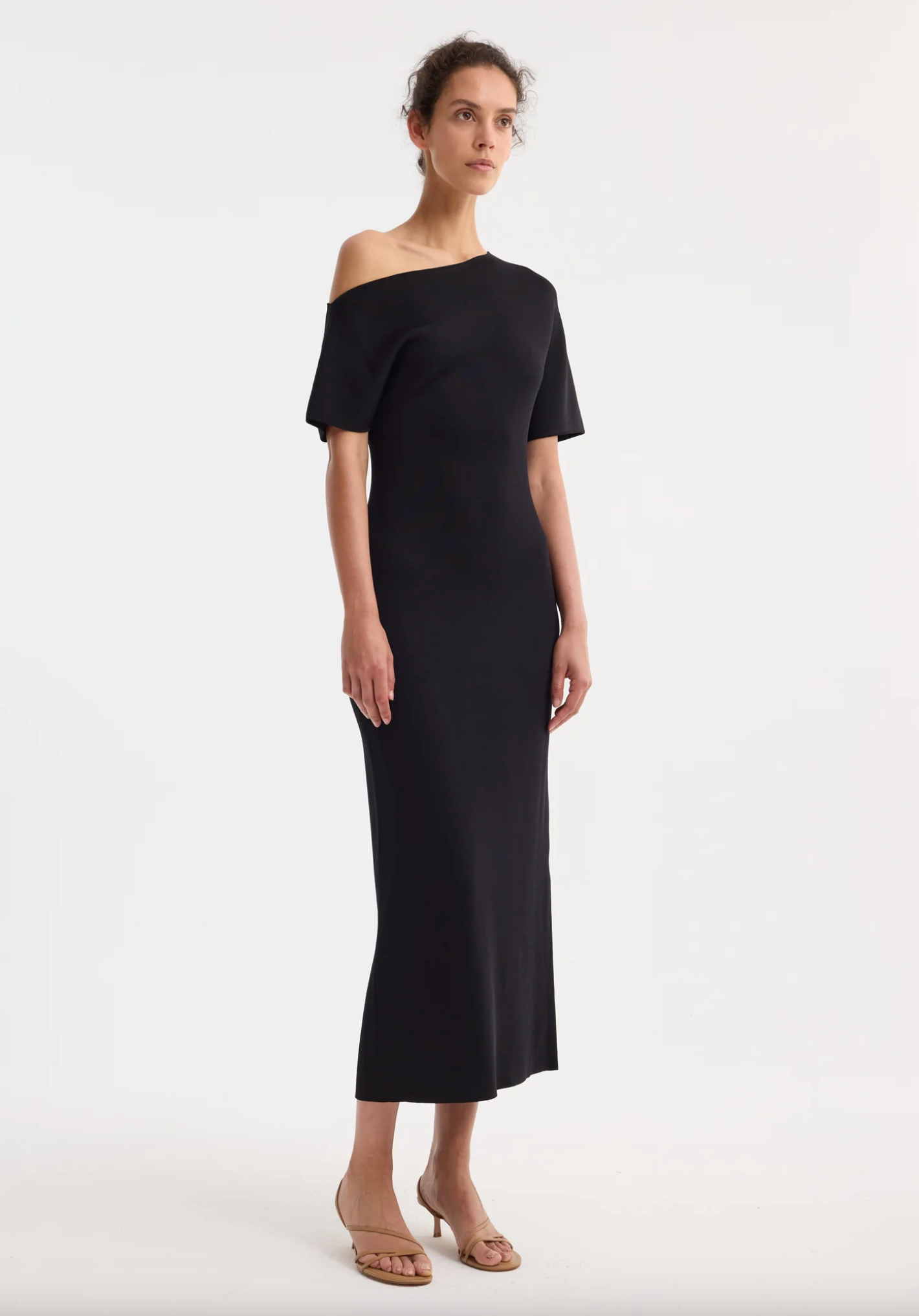 ASYMMETRICAL KNITTED DRESS: BLACK