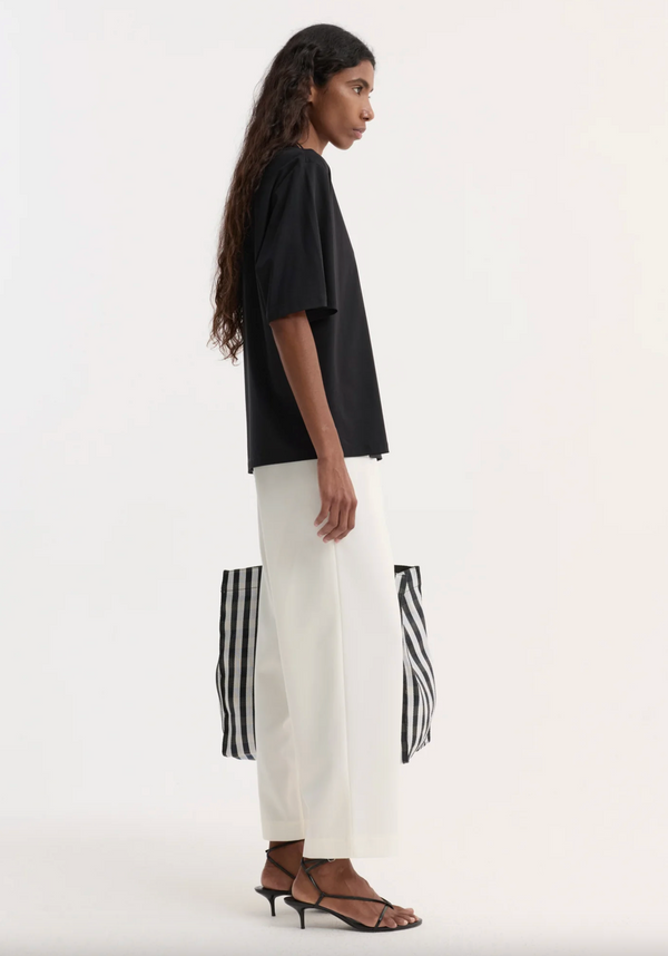 cropped wide leg trousers: off white