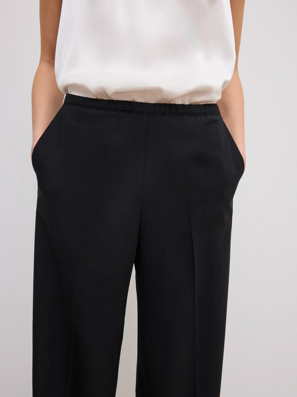 Elastic wool trousers: black